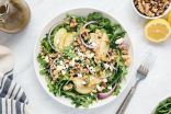 Fresh Arugula Salad, Packed With goat cheese,Walnuts, Red Onions, and a Delicious Lemon Balsamic Vinaigrette