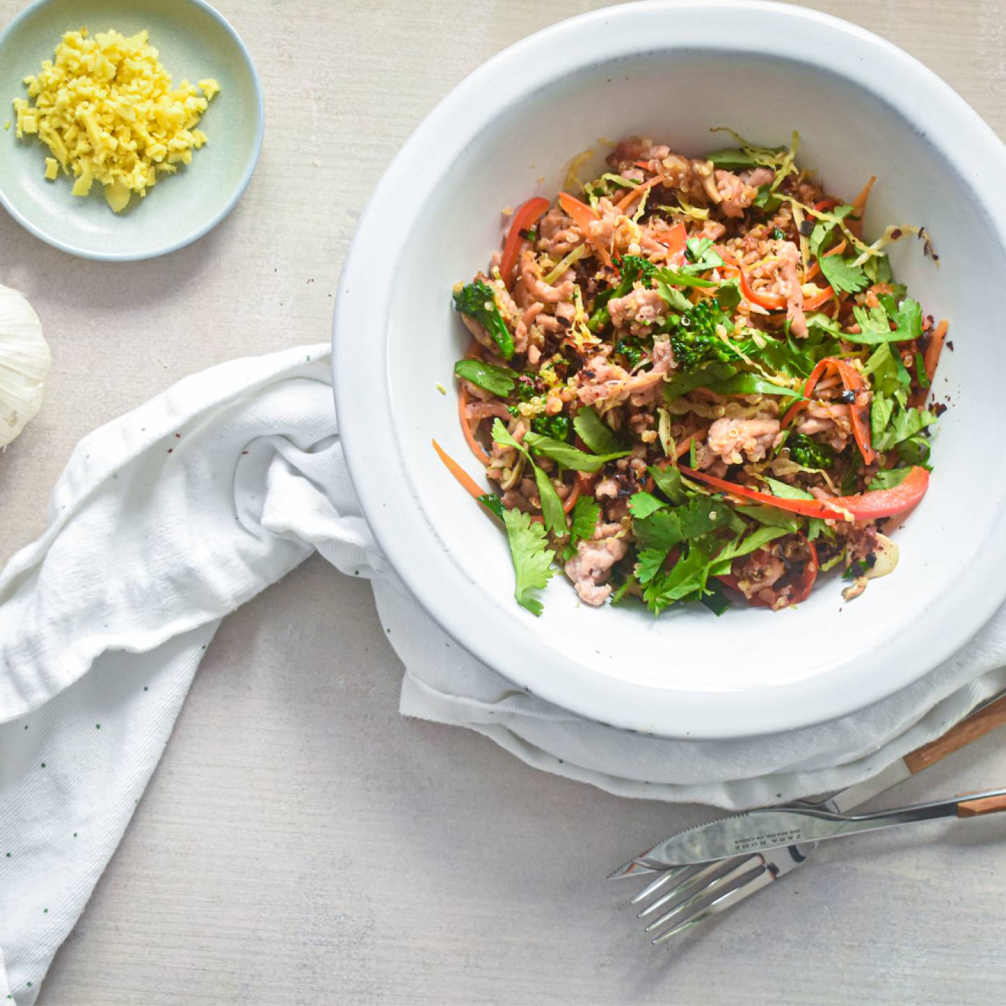 Asian quinoa and turkey stir fry with lean ground turkey, cooked quinoa, fresh vegetables, and stir fry sauce.