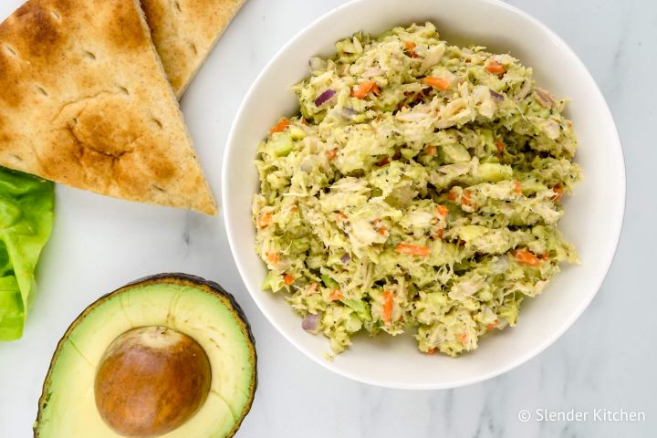 Avocado tuna salad with red onion, celery, and carrots.