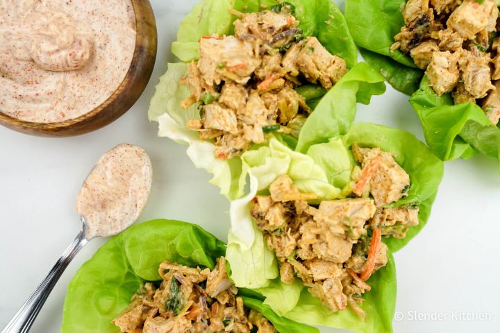 Blackened chicken salad served in lettuce wraps.