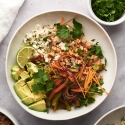 Taco bowls with cauliflower rice, peppers, onions, and ground turkey.