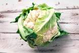 Fresh cauliflower on a wooden surface