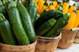 Fresh zucchinis in baskets