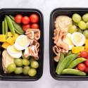 Make ahead lunch protein boxes with hard boiled eggs, deli meat, tomatoes, cheese, hummus, and grapes.