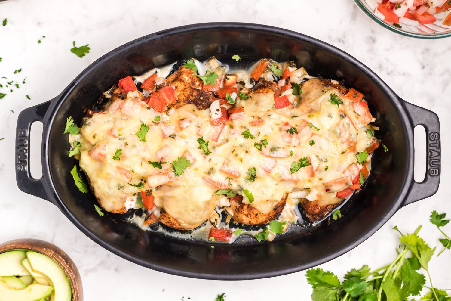 Salsa chicken with pico de gallo salsa, melted cheese, and cilantro.