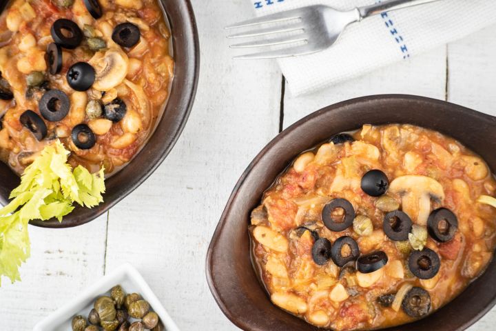 Slow Cooker White Beans with tomatoes, capers, mushrooms, and olives.